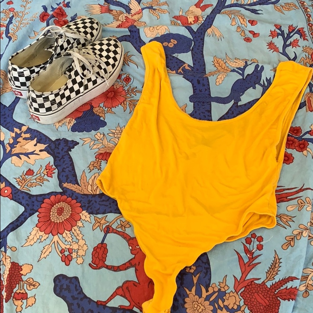 Yellow scoop next body suit